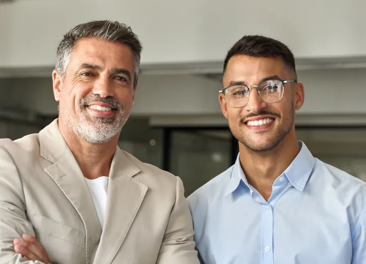 Local business owners smiling